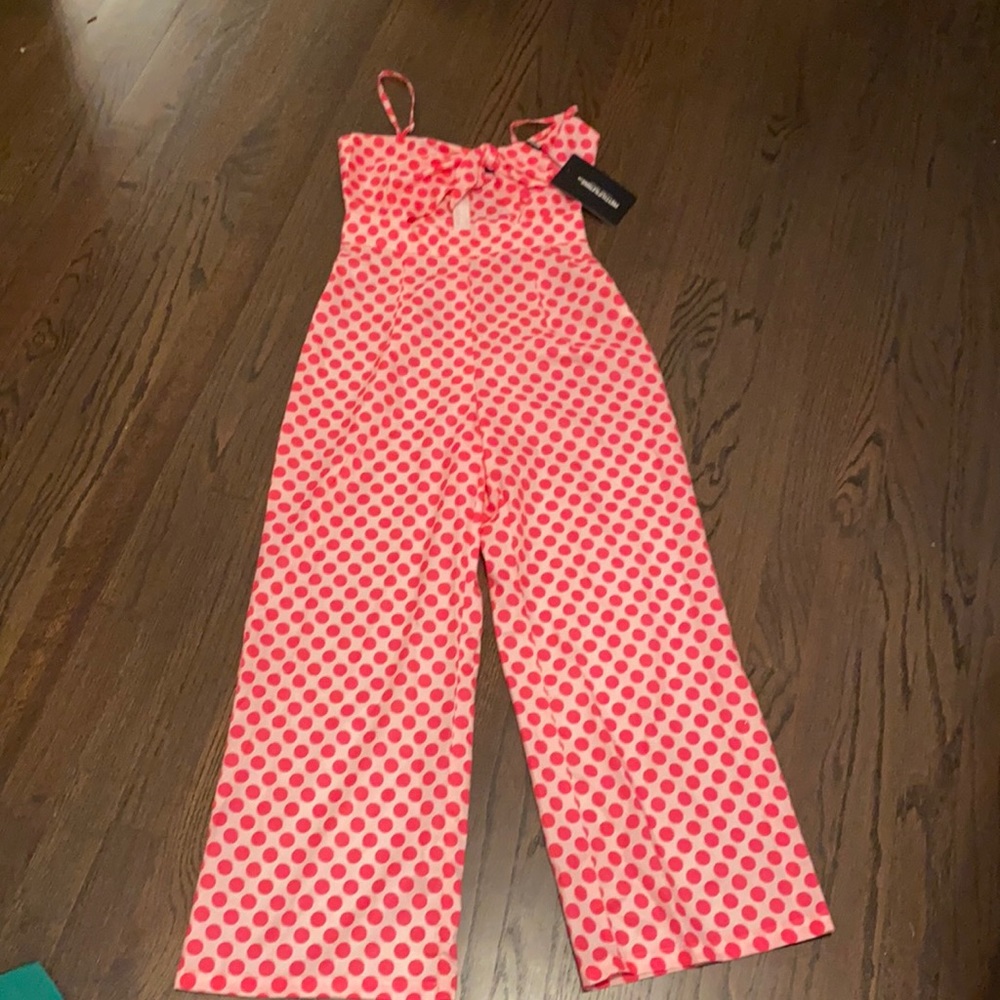 PrettyLittleThing | polkadot Pink tie front Jumpsuit